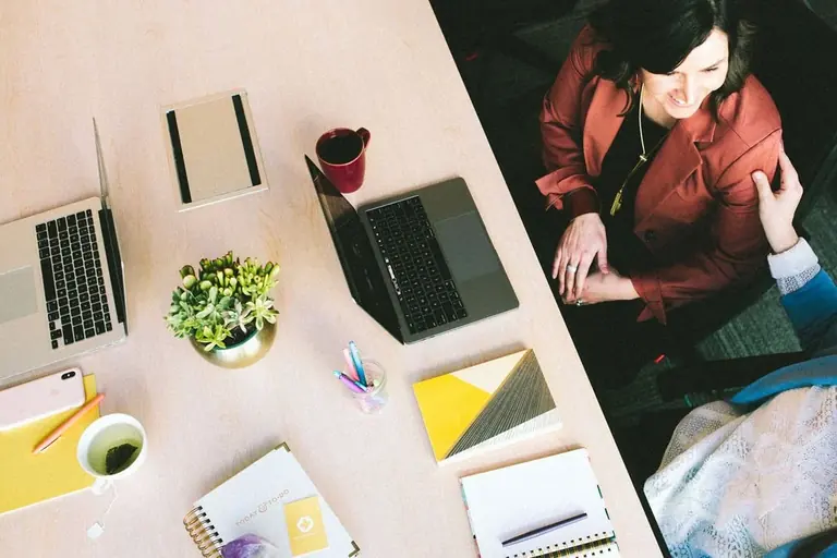Creative professional working in a bright modern small business studio